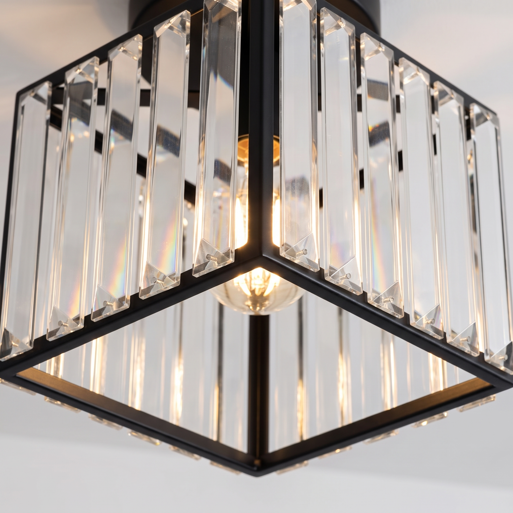 Close up of the Arlo faceted crystal prisms and black metal frame