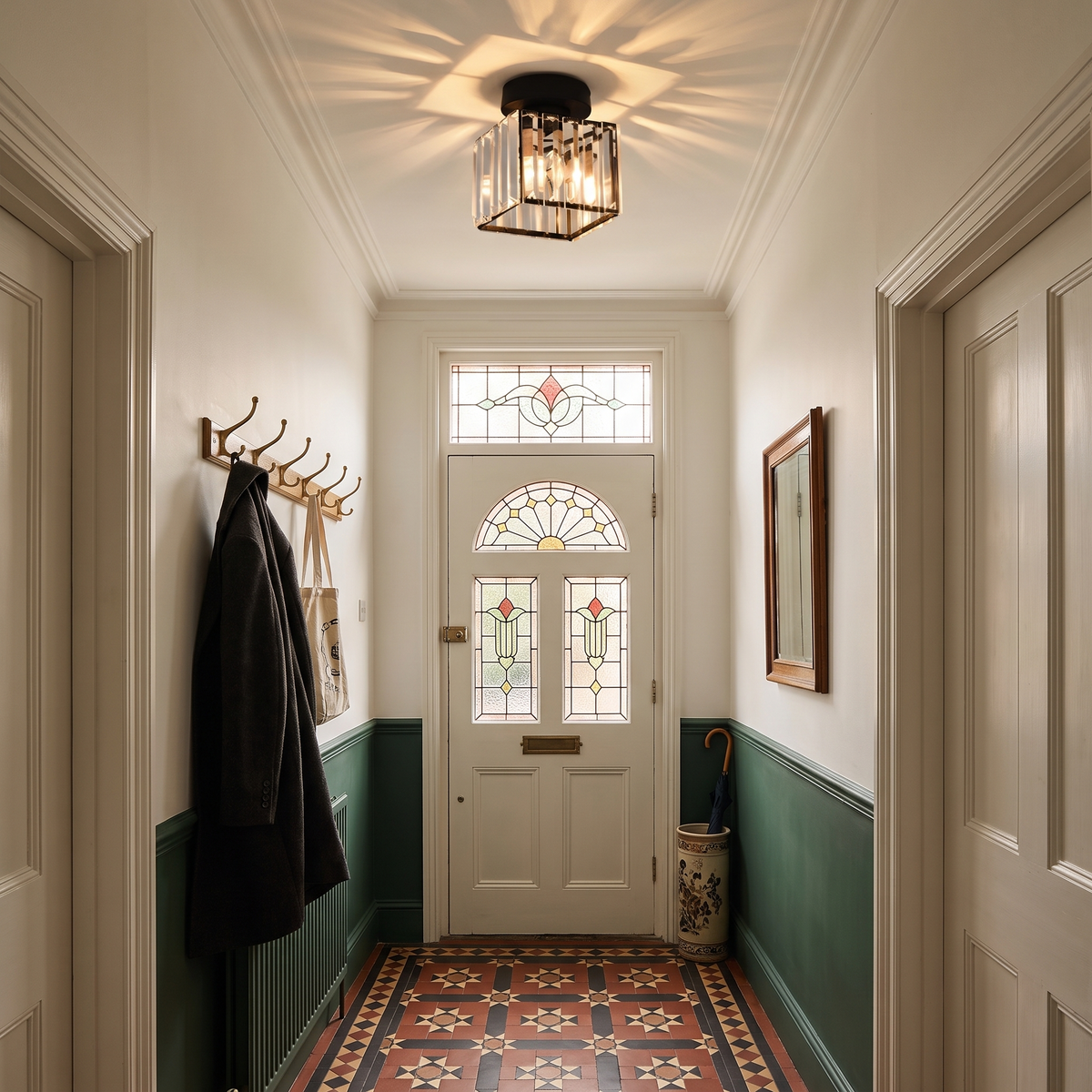 Arlo black crystal flush mount ceiling light in a Victorian tiled hallway