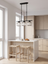 Fjord crystal pendant light hanging at an adjustable height above a breakfast bar
