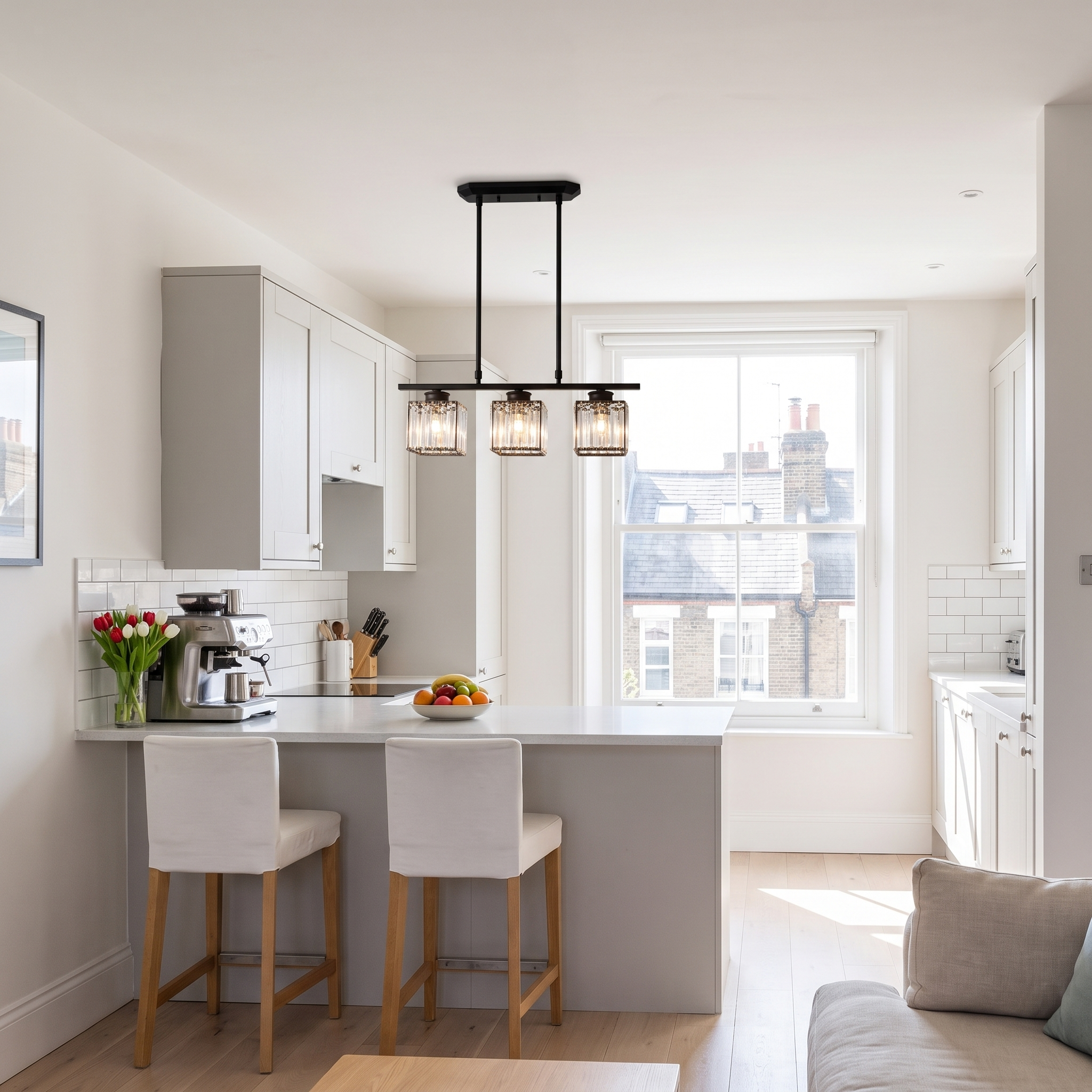 Fjord crystal pendant light above a breakfast bar in a London flat