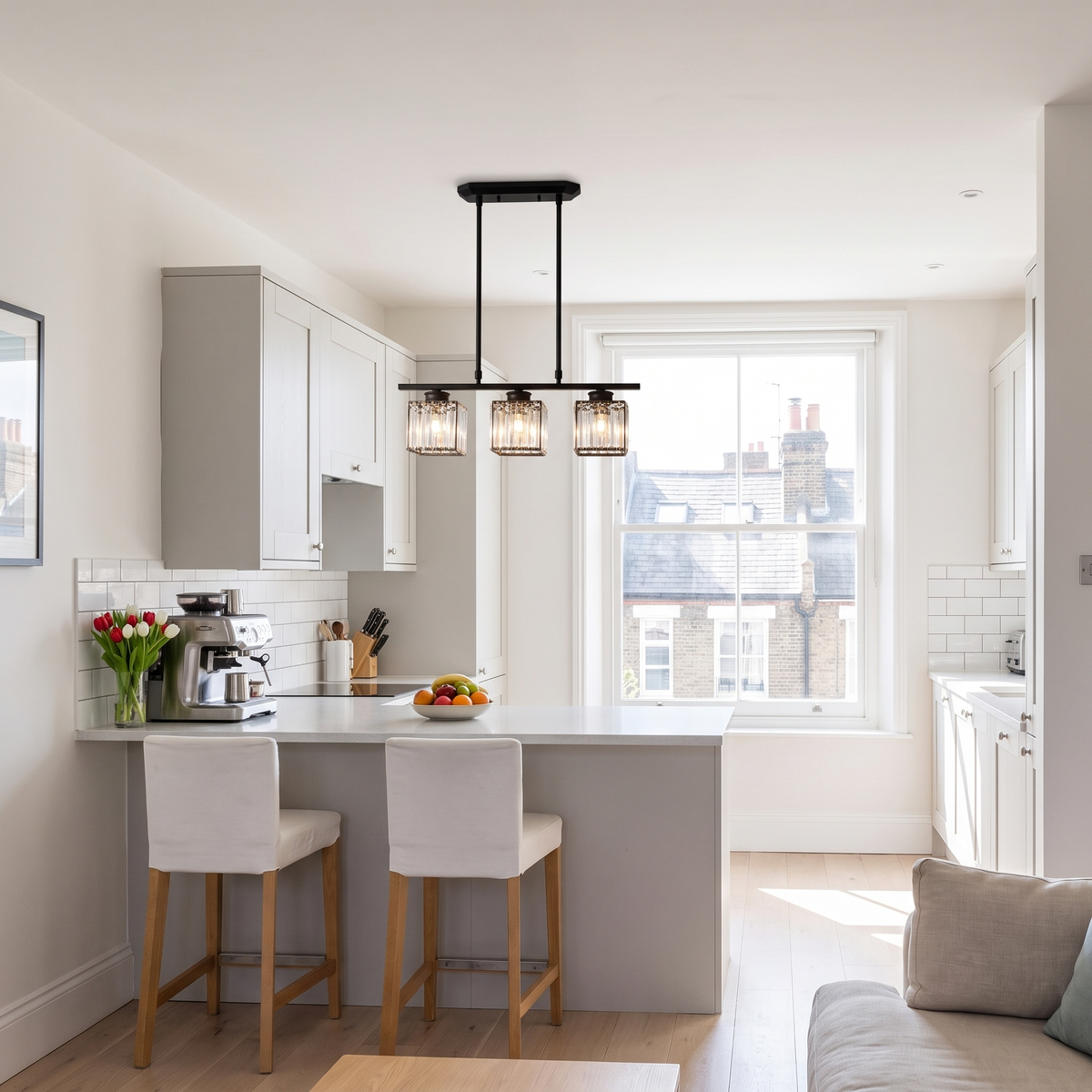 Fjord crystal pendant light above a breakfast bar in a London flat
