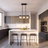 Fjord crystal pendant light above a marble kitchen island