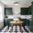 Halo ceiling light above a breakfast table in a green shaker kitchen